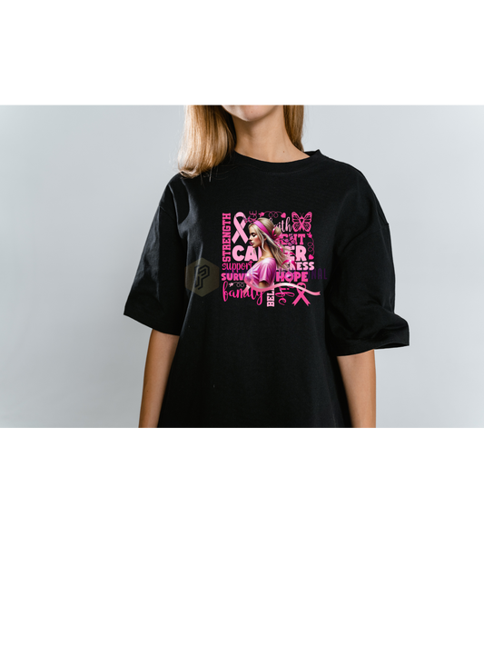 Person wearing a black t-shirt with pink breast cancer awareness design.