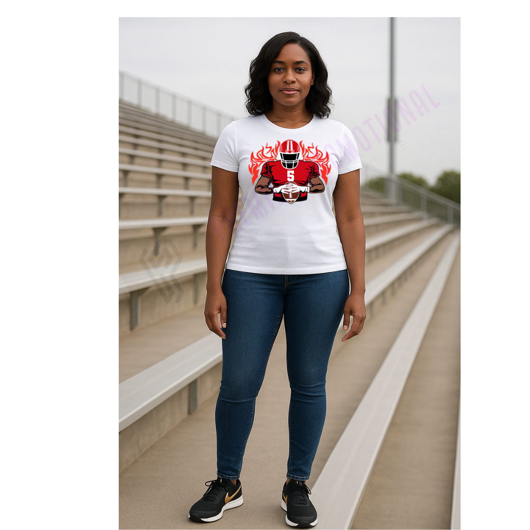 Person wearing a white t-shirt with a graphic design in an outdoor setting