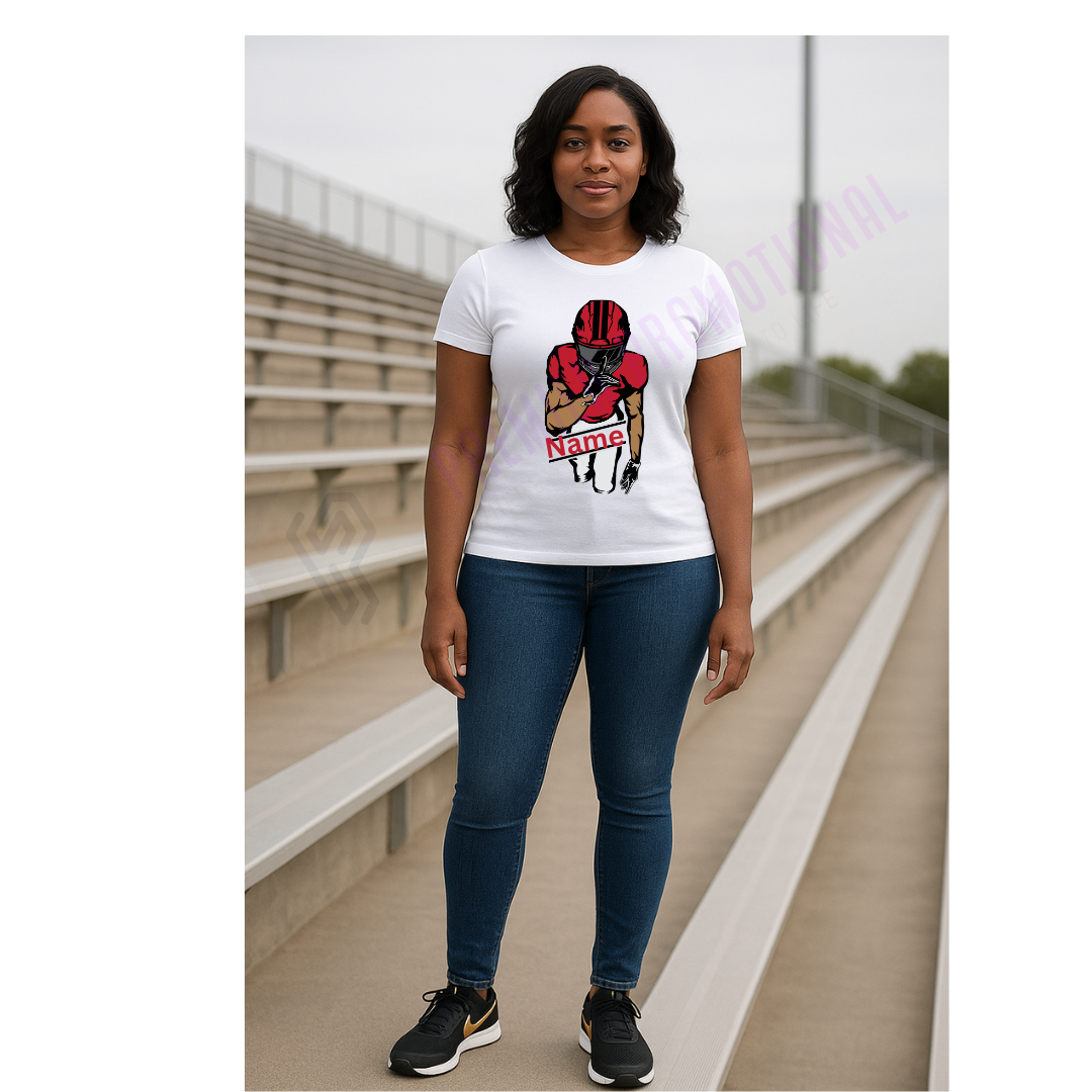 Person wearing a white t-shirt with a graphic design in an outdoor setting