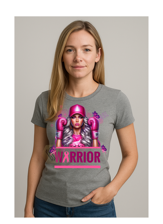 Woman wearing a gray t-shirt with a graphic design of a woman in boxing gloves and a pink warrior graphic.